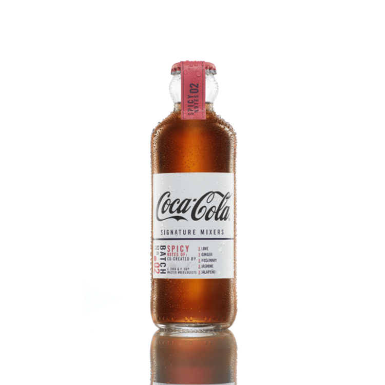 Coca-Cola Signature Mixers Spicy Notes bottle on white background.